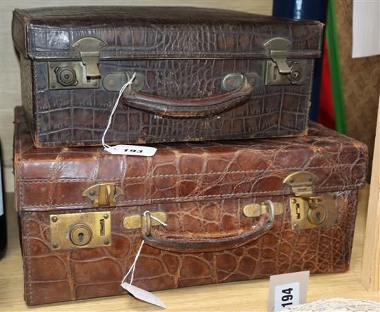 Two crocodile skin cases, early 20th century